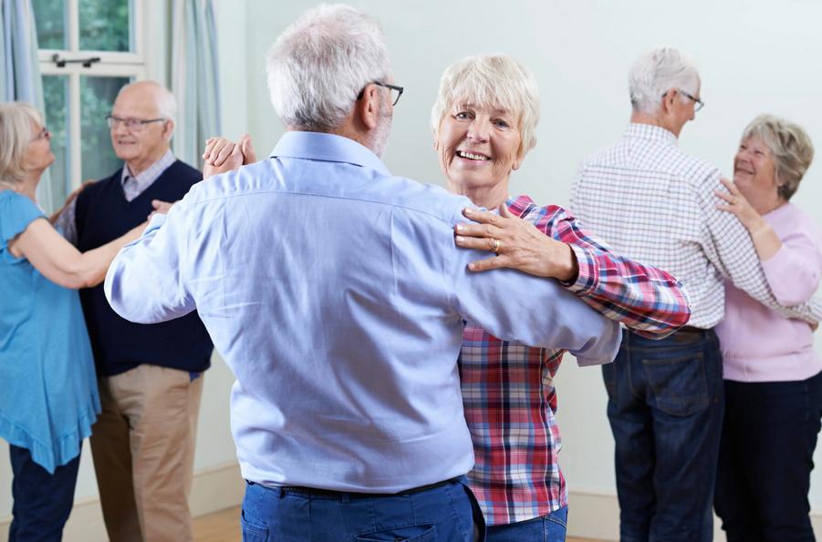 Seniors ballroom dancing together